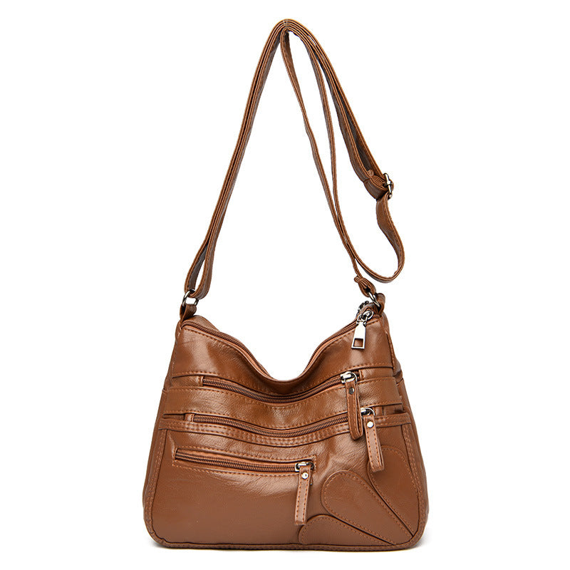 Soft leather large capacity shoulder bag in various colors, designed for middle-aged women, showcasing its stylish and spacious design.