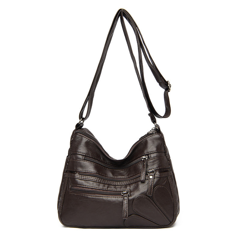 Soft leather large capacity shoulder bag in various colors, designed for middle-aged women, showcasing its stylish and spacious design.