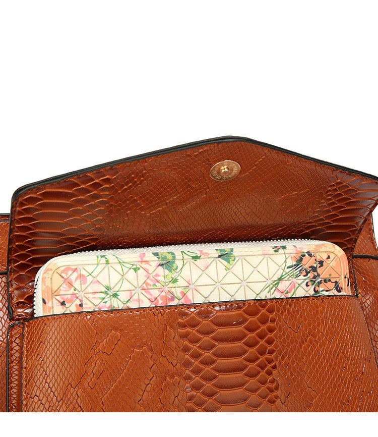 Solid Color Women's Snake Printed Messenger Bag showcasing stylish snake print design and spacious interior.