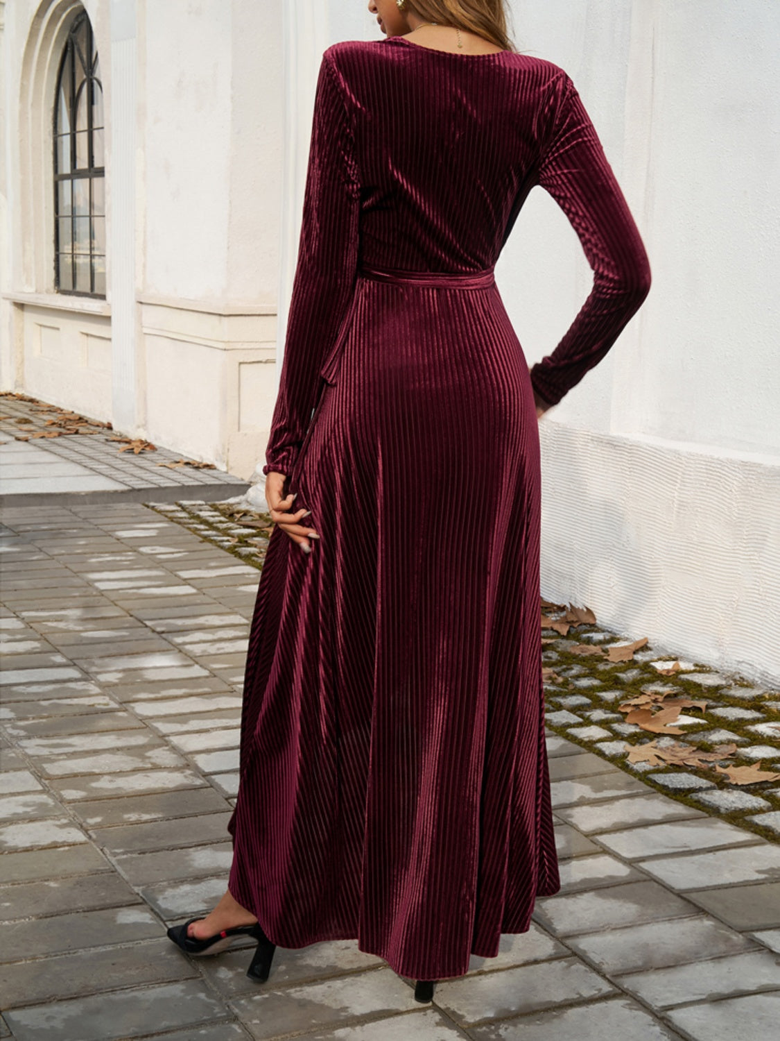 A stylish Split Surplice Long Sleeve Midi Dress featuring a tied design and long sleeves, perfect for various occasions.