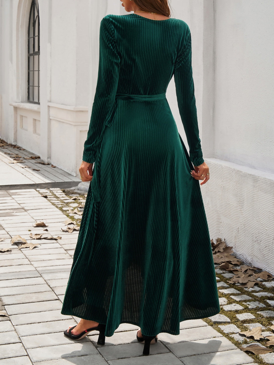 A stylish Split Surplice Long Sleeve Midi Dress featuring a tied design and long sleeves, perfect for various occasions.