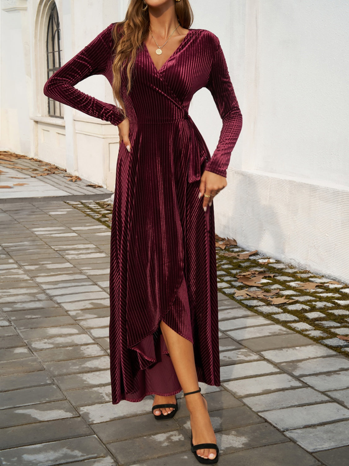 A stylish Split Surplice Long Sleeve Midi Dress featuring a tied design and long sleeves, perfect for various occasions.