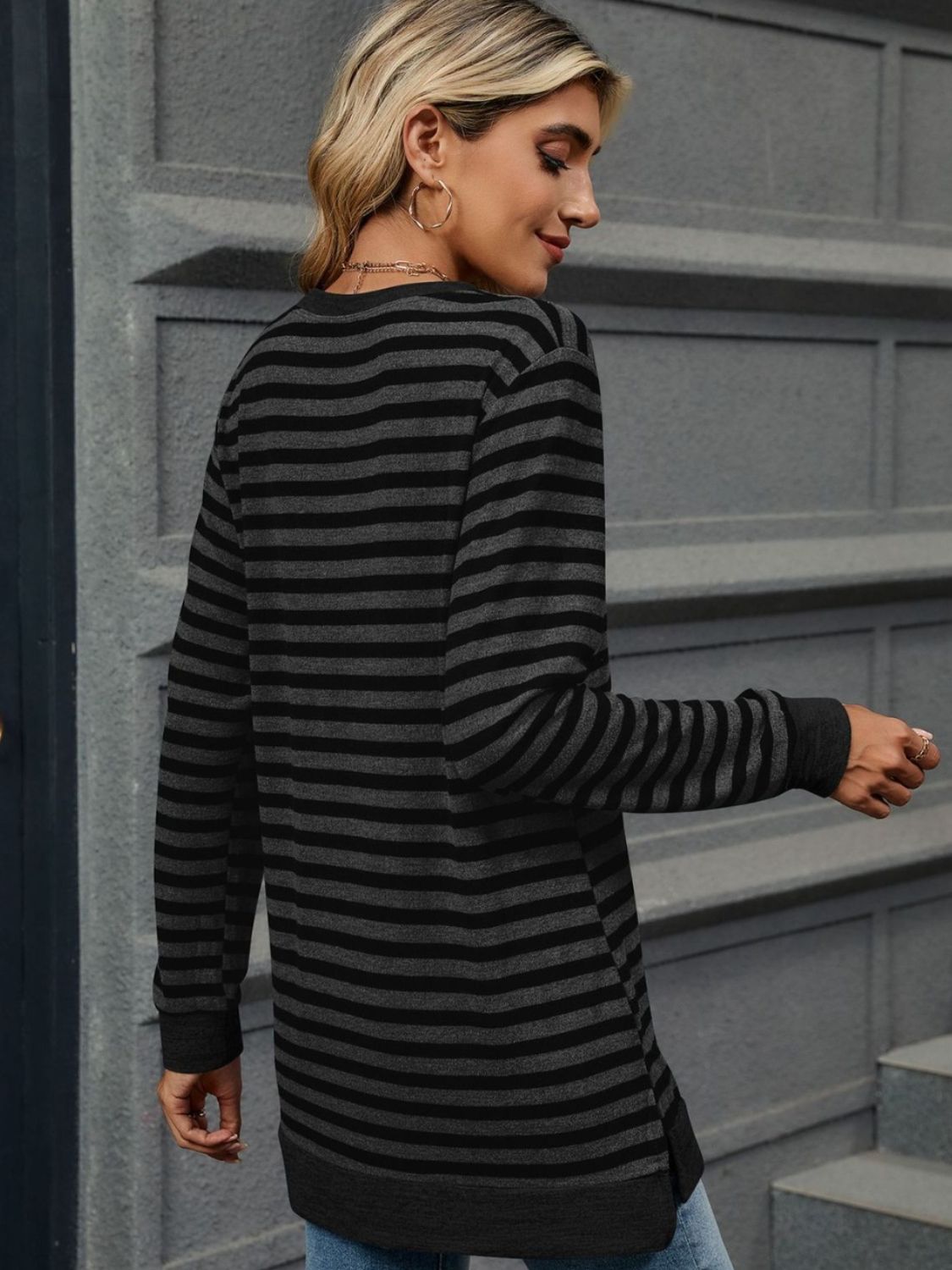 Striped round neck long sleeve t-shirt in various sizes, showcasing its stylish design and comfortable fit.