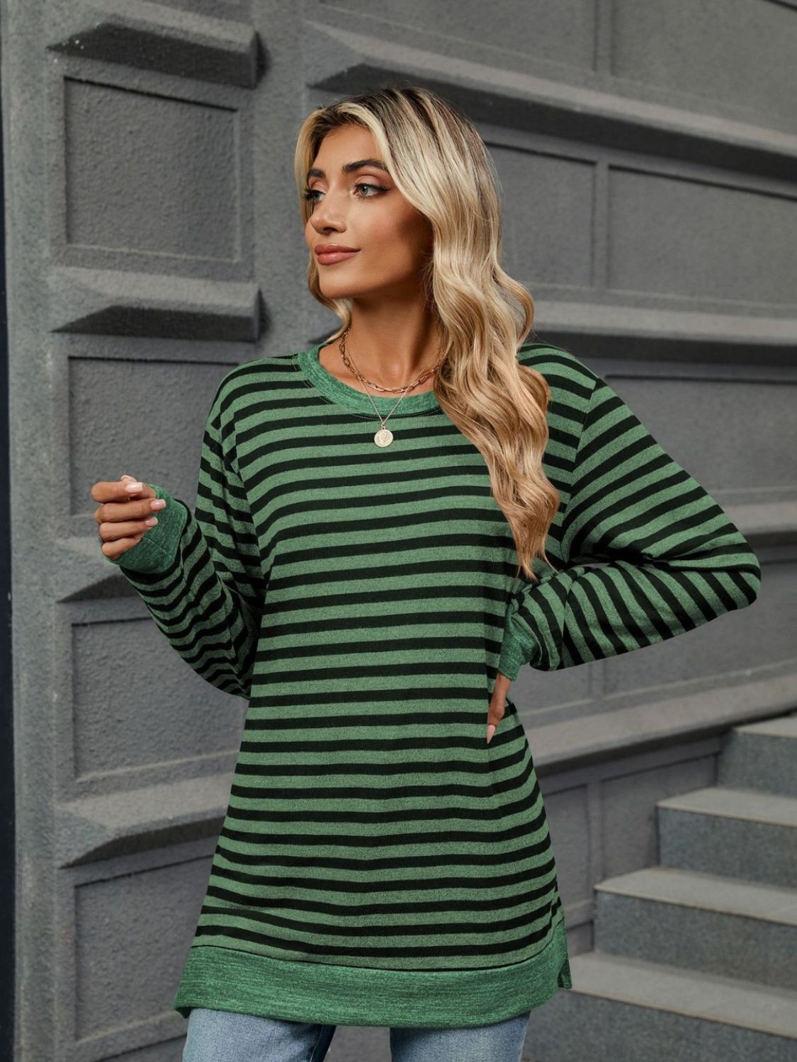 Striped round neck long sleeve t-shirt in various sizes, showcasing its stylish design and comfortable fit.