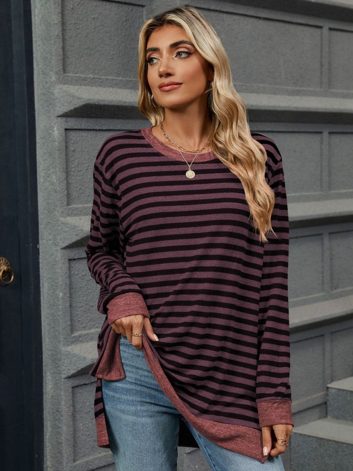 Striped round neck long sleeve t-shirt in various sizes, showcasing its stylish design and comfortable fit.