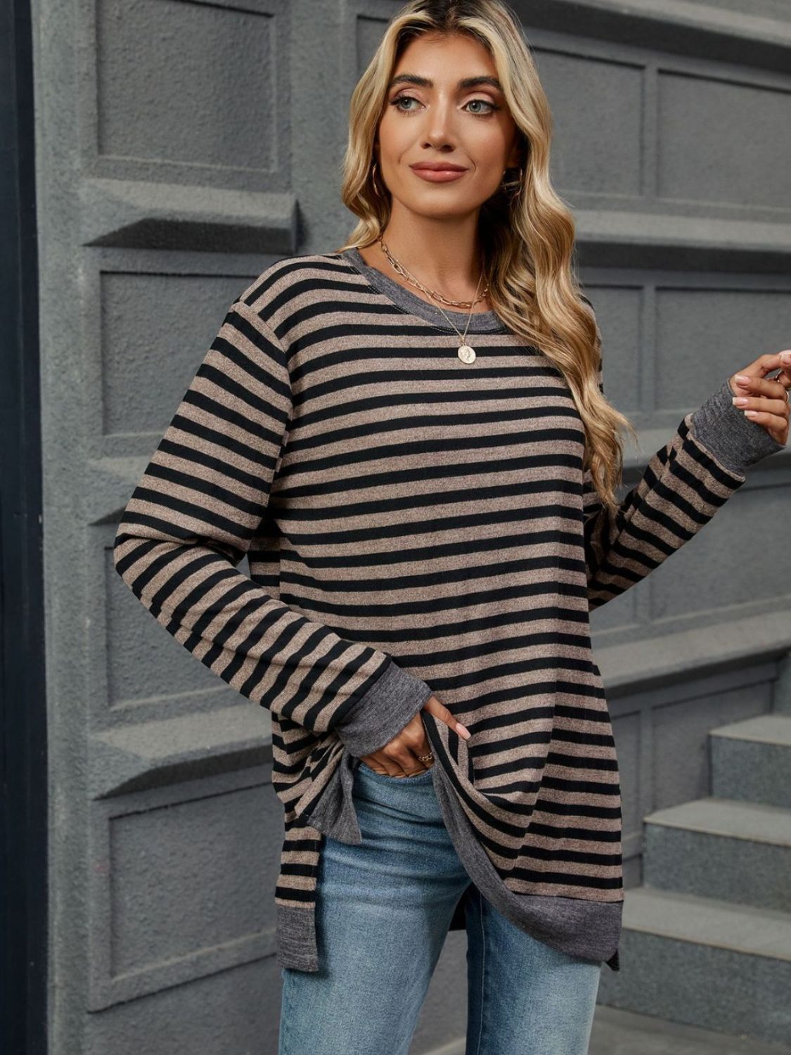 Striped round neck long sleeve t-shirt in various sizes, showcasing its stylish design and comfortable fit.