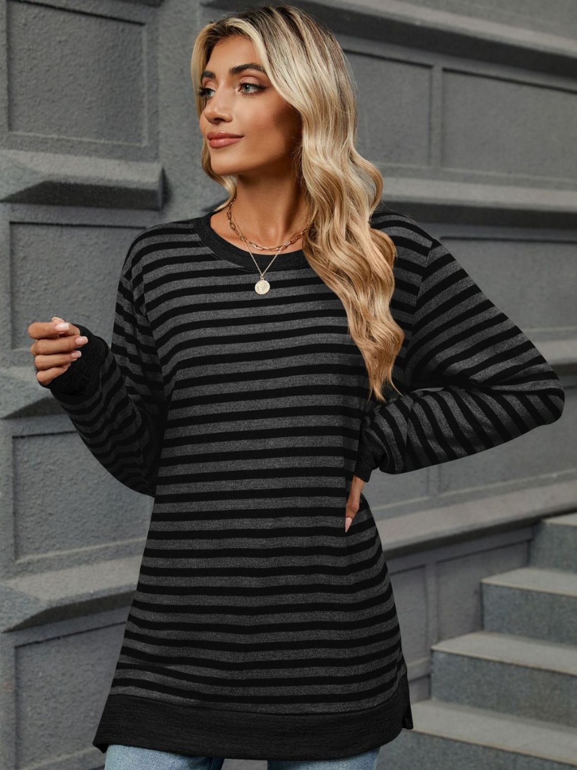 Striped round neck long sleeve t-shirt in various sizes, showcasing its stylish design and comfortable fit.