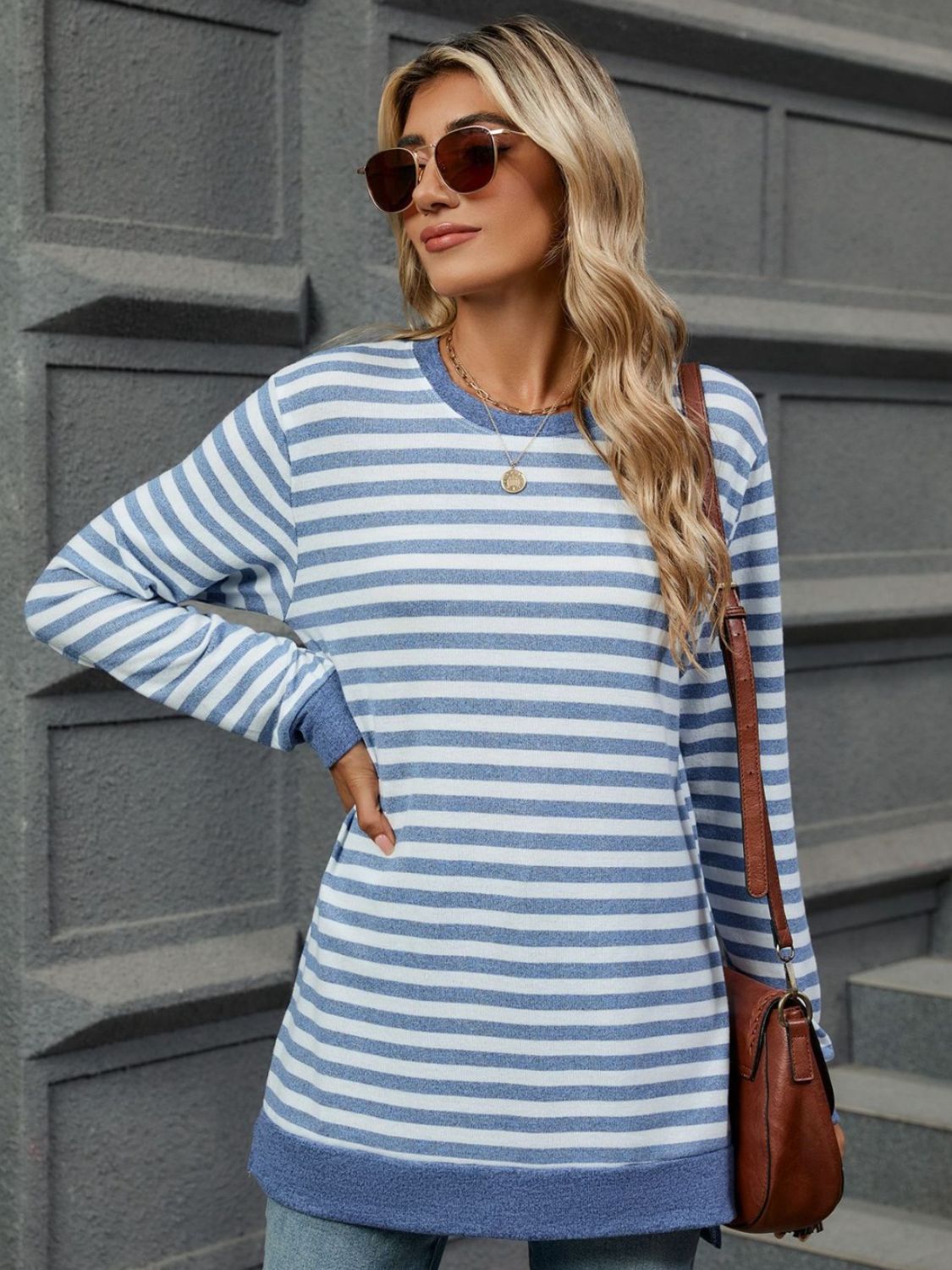 Striped round neck long sleeve t-shirt in various sizes, showcasing its stylish design and comfortable fit.