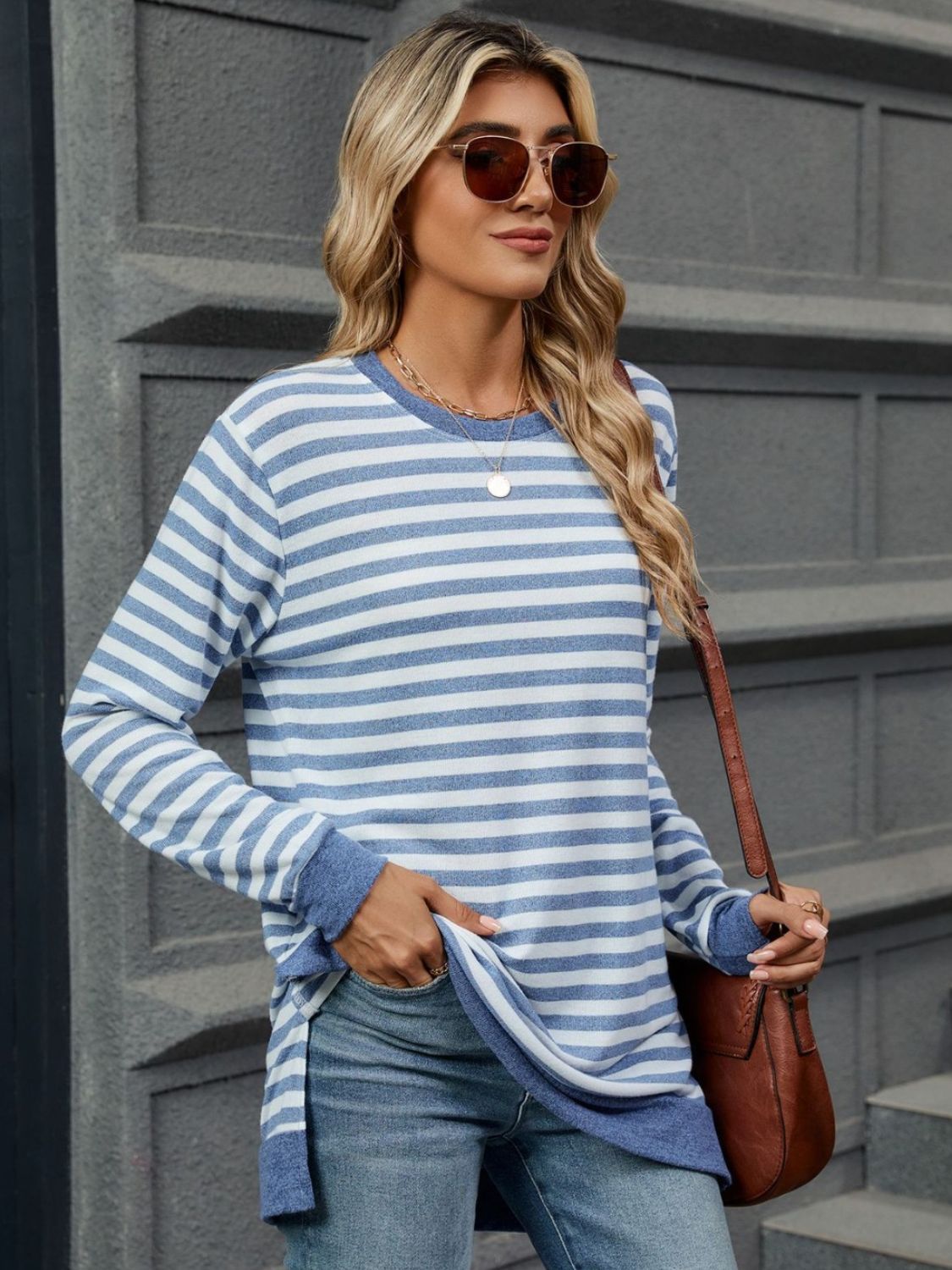 Striped round neck long sleeve t-shirt in various sizes, showcasing its stylish design and comfortable fit.