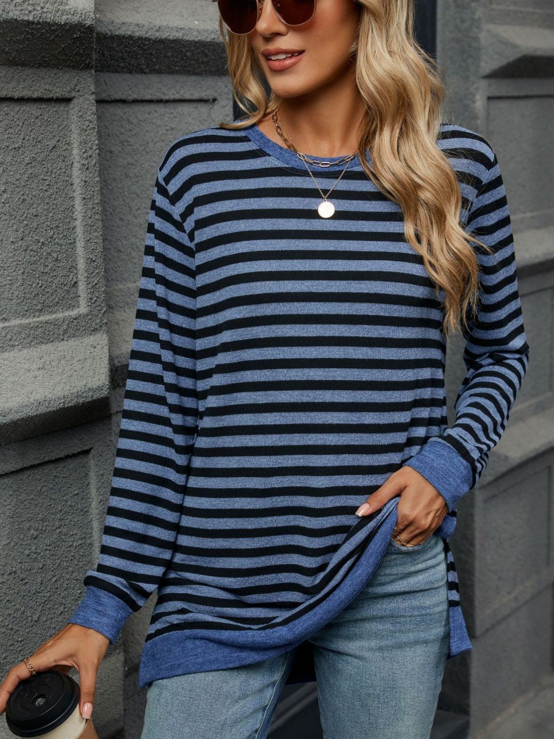 Striped round neck long sleeve t-shirt in various sizes, showcasing its stylish design and comfortable fit.