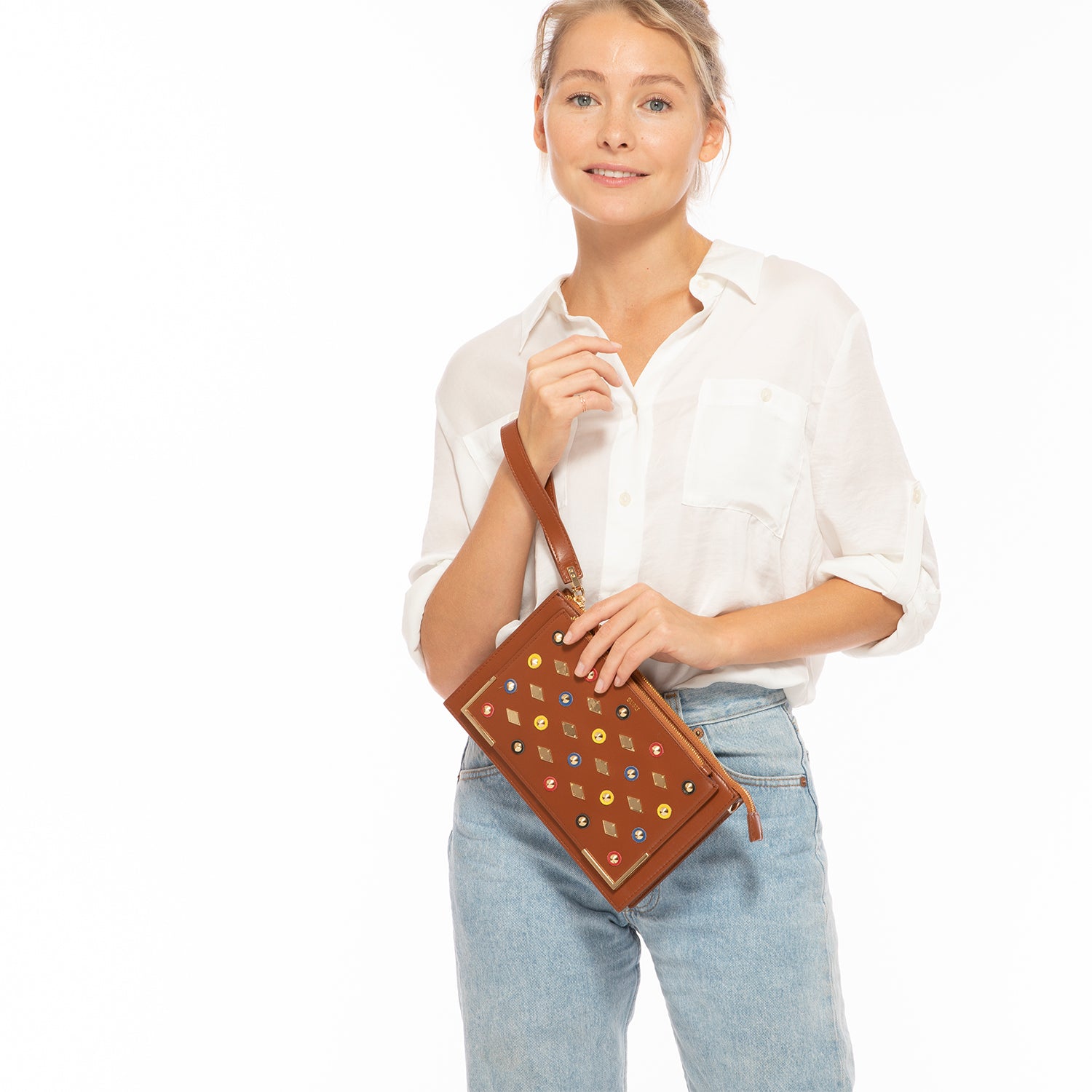 Stylish Studded Crossbody Brown Clutch with gold hardware and leather appliques, featuring a chic square silhouette.