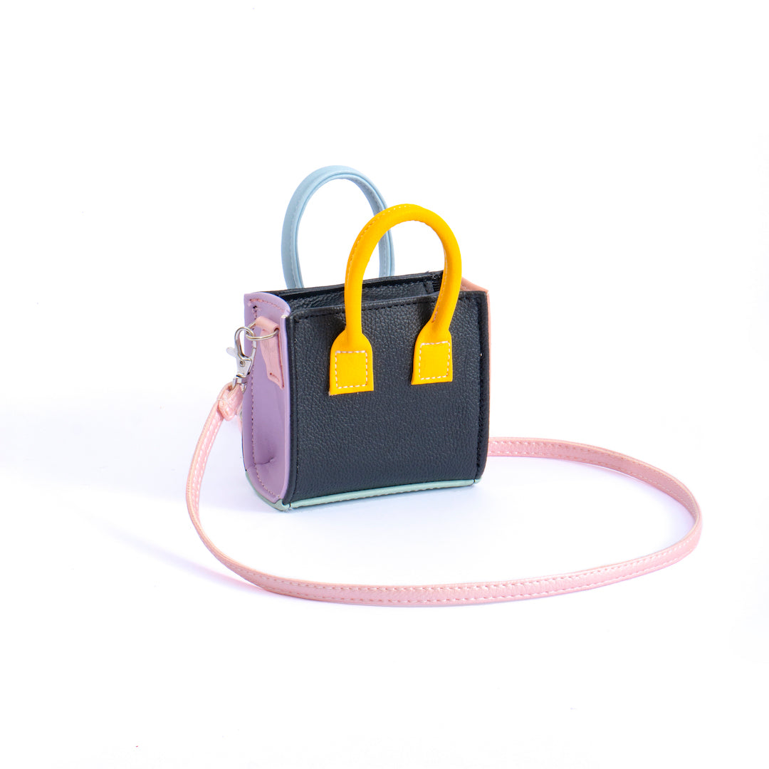 Sugar Cube Micro Bag in Animal Print Pink, showcasing its unique dual design and compact size.