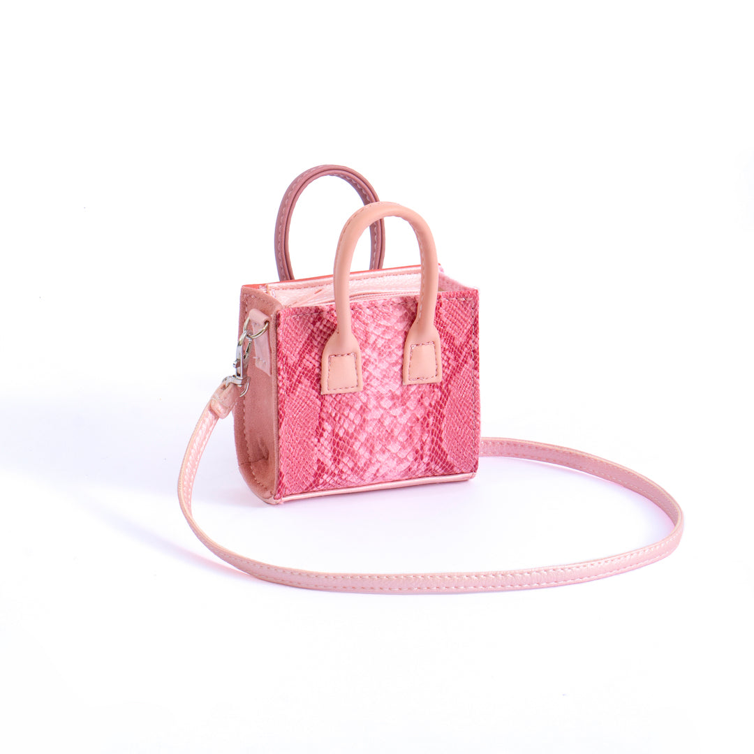 Sugar Cube Micro Bag in Animal Print Pink, showcasing its unique dual design and compact size.