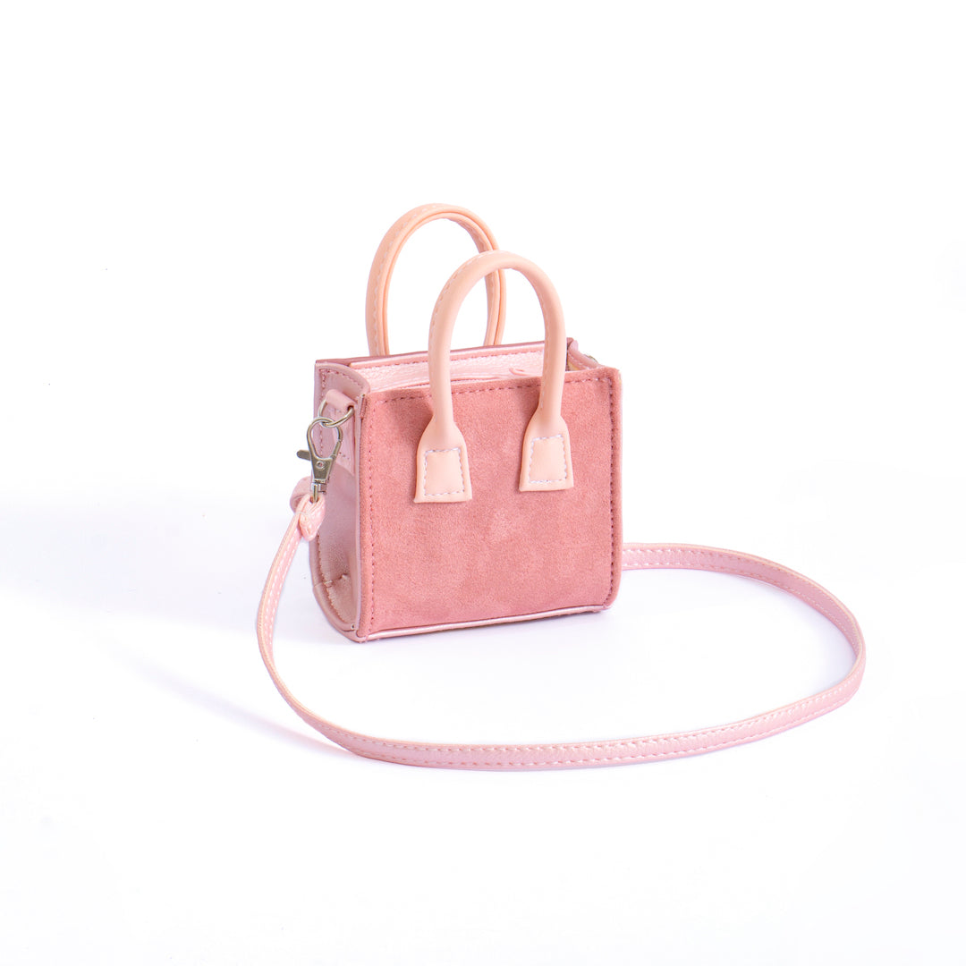 Sugar Cube Micro Bag in Animal Print Pink, showcasing its unique dual design and compact size.