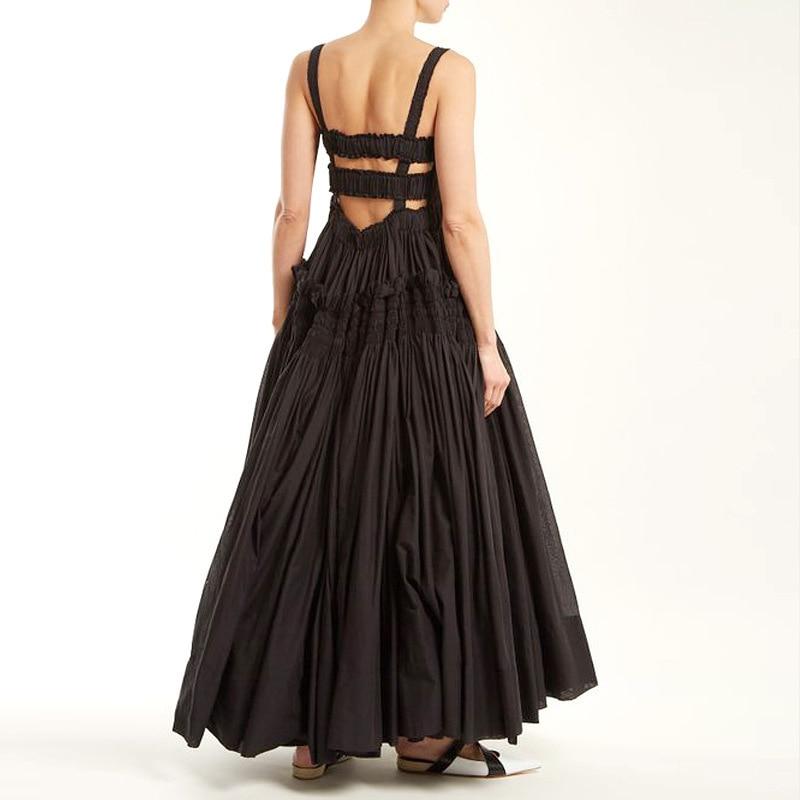 A stylish Summer Sling Backless Pleated Vintage Dress featuring a pleated design, slash neck, and mid-calf length, perfect for casual outings.