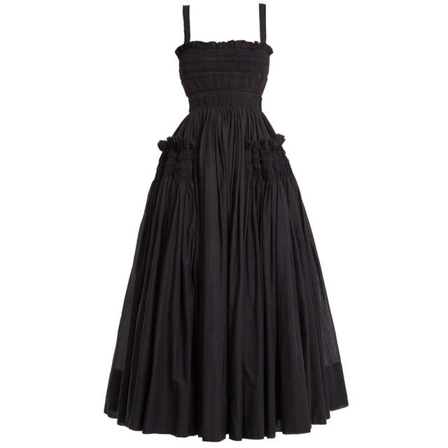 A stylish Summer Sling Backless Pleated Vintage Dress featuring a pleated design, slash neck, and mid-calf length, perfect for casual outings.