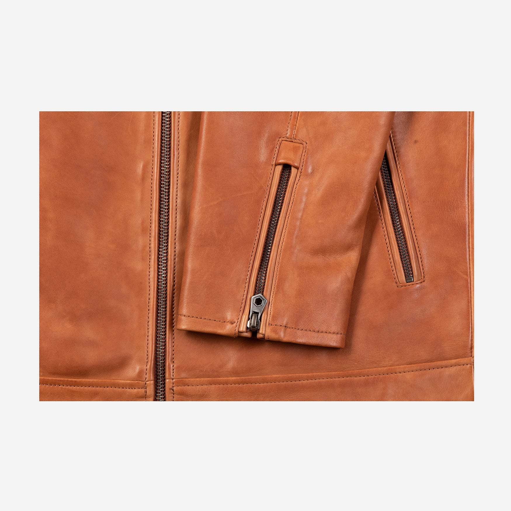 Sutherland Classic Jacket in Tan, made from premium lambskin leather with a stylish collar, perfect for various occasions.