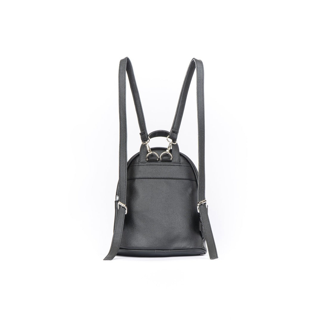 Tabby Medium Backpack in vibrant colors made of vegan leather, showcasing spacious design and adjustable straps.