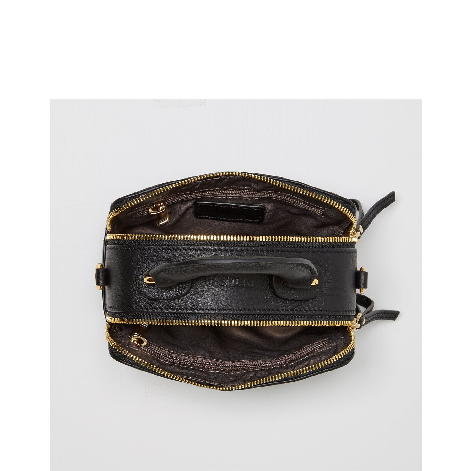 Taylor Black Small Crossbody Bag made of quilted leather with gold hardware and adjustable strap.