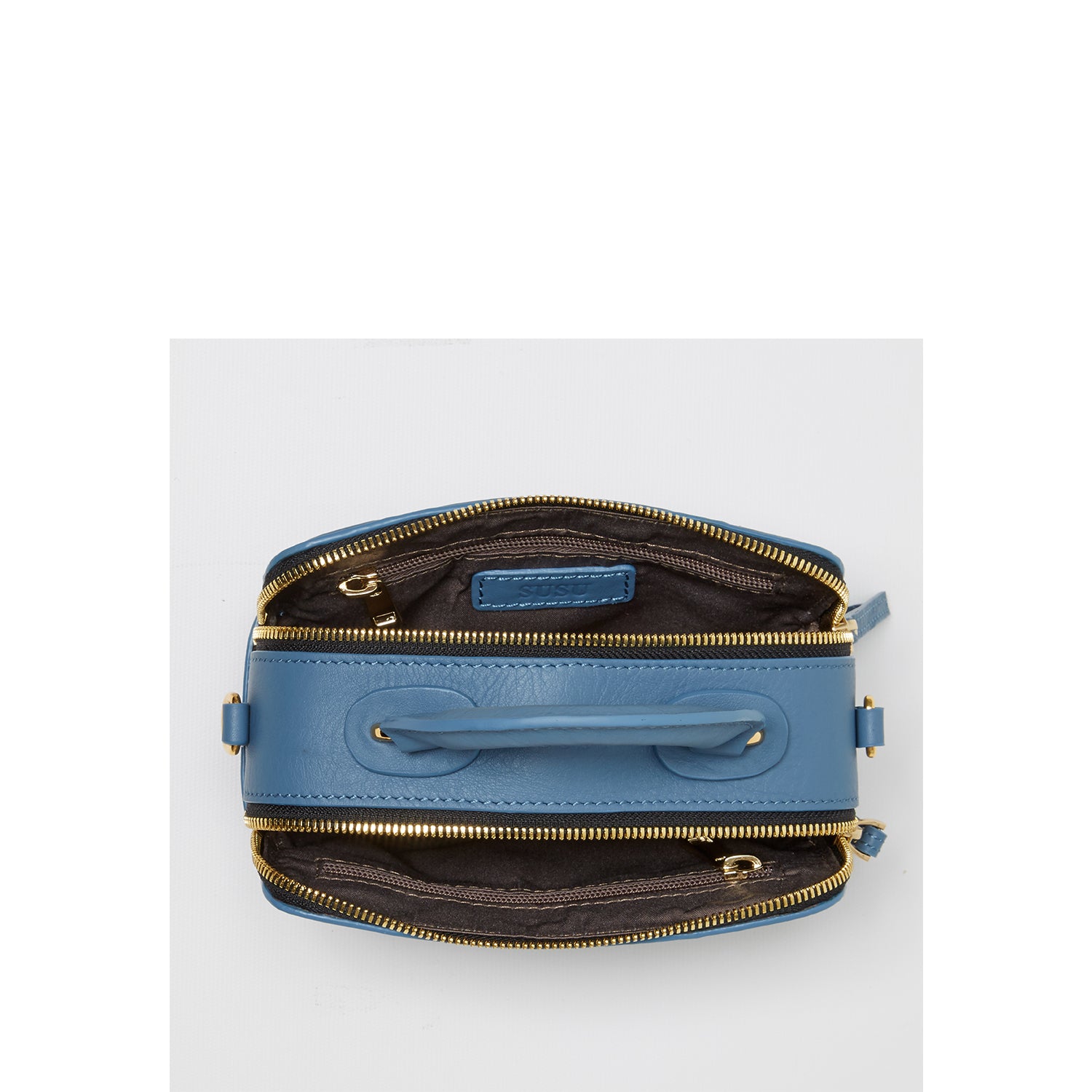 Taylor Small Crossbody Bag in blue, made of quilted Italian leather with gold hardware and adjustable strap.