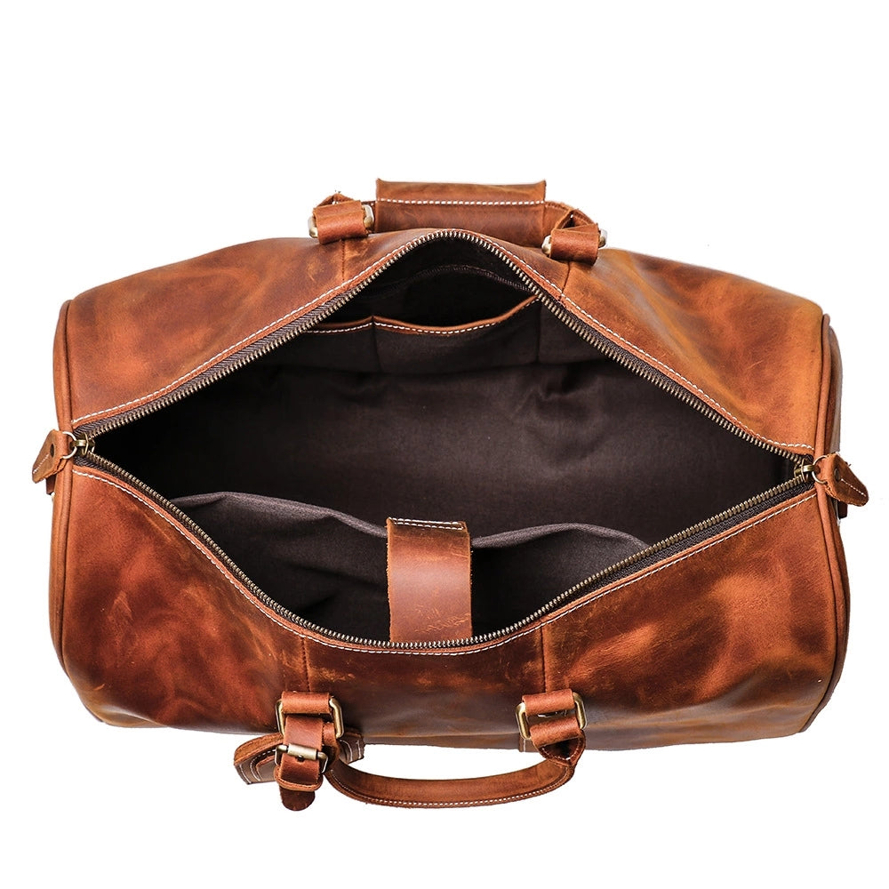 The Brandt Weekender small leather duffle bag in high-quality crazy horse leather, showcasing its spacious design and stylish appearance.