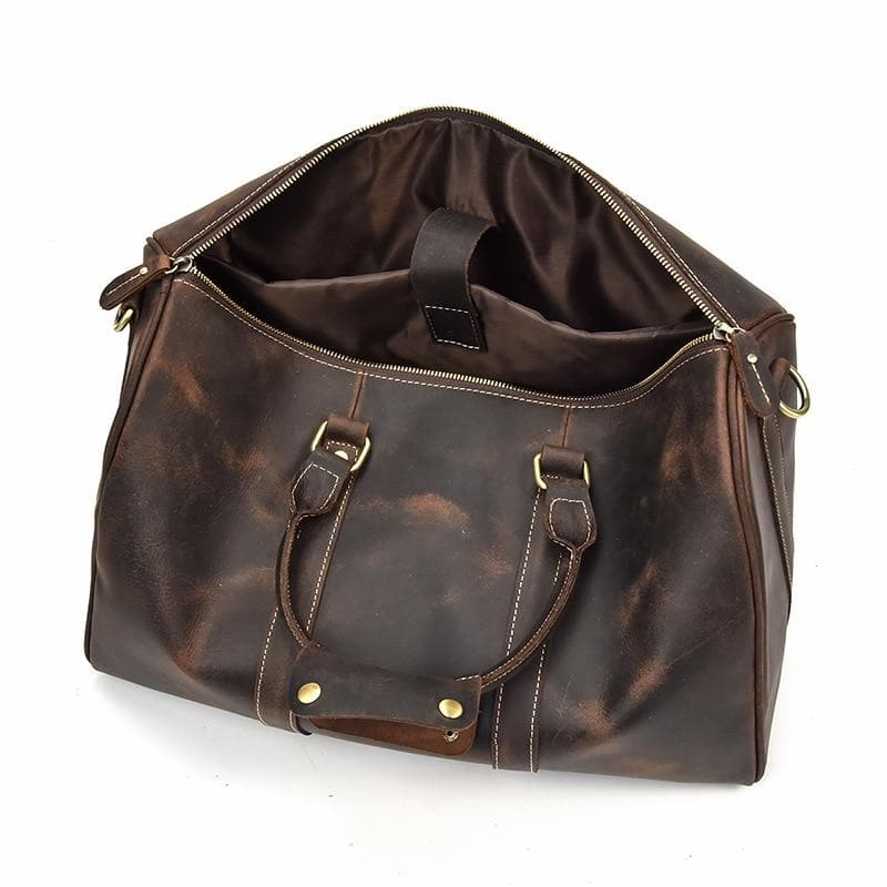 The Brandt Weekender small leather duffle bag in high-quality crazy horse leather, showcasing its spacious design and stylish appearance.