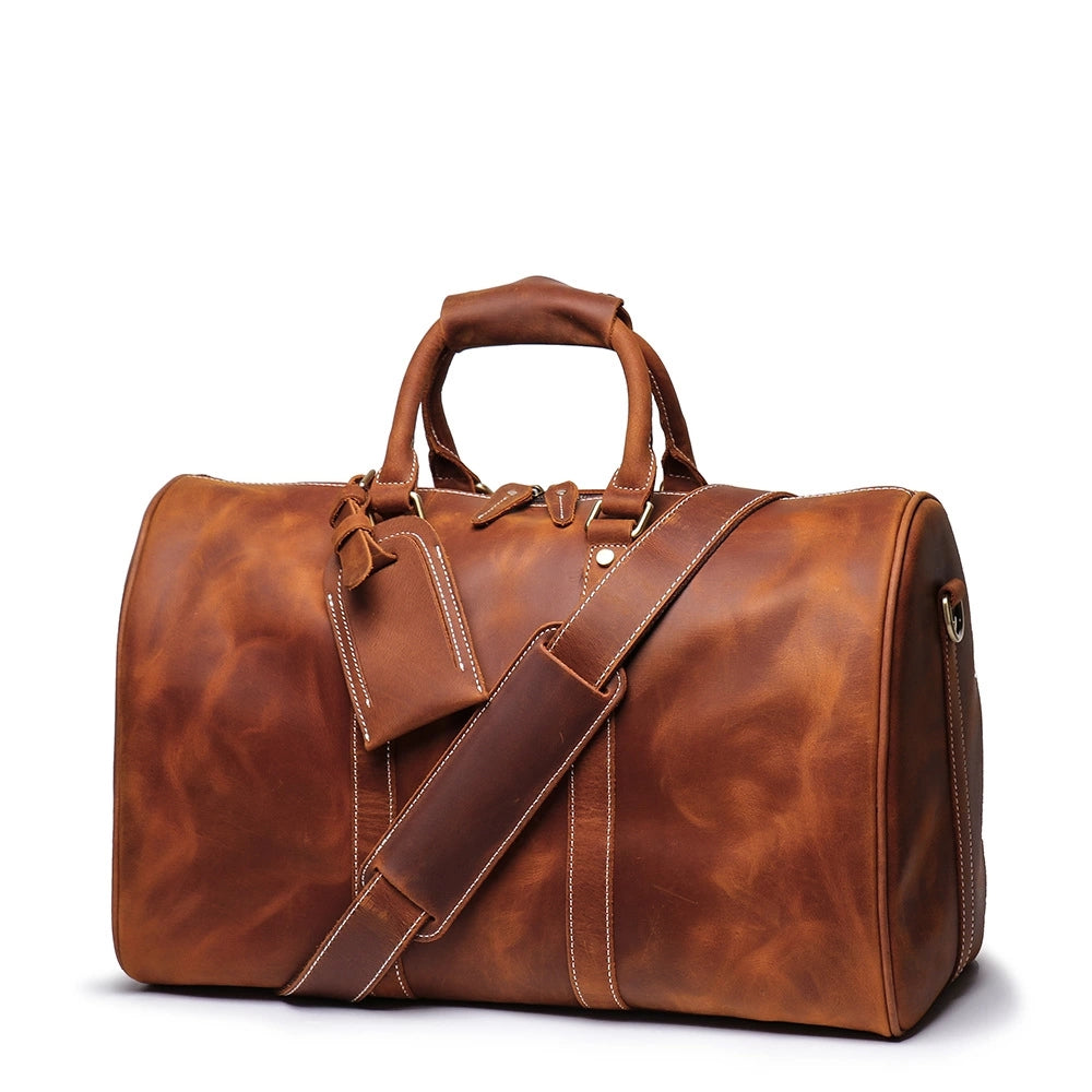 The Brandt Weekender small leather duffle bag in high-quality crazy horse leather, showcasing its spacious design and stylish appearance.