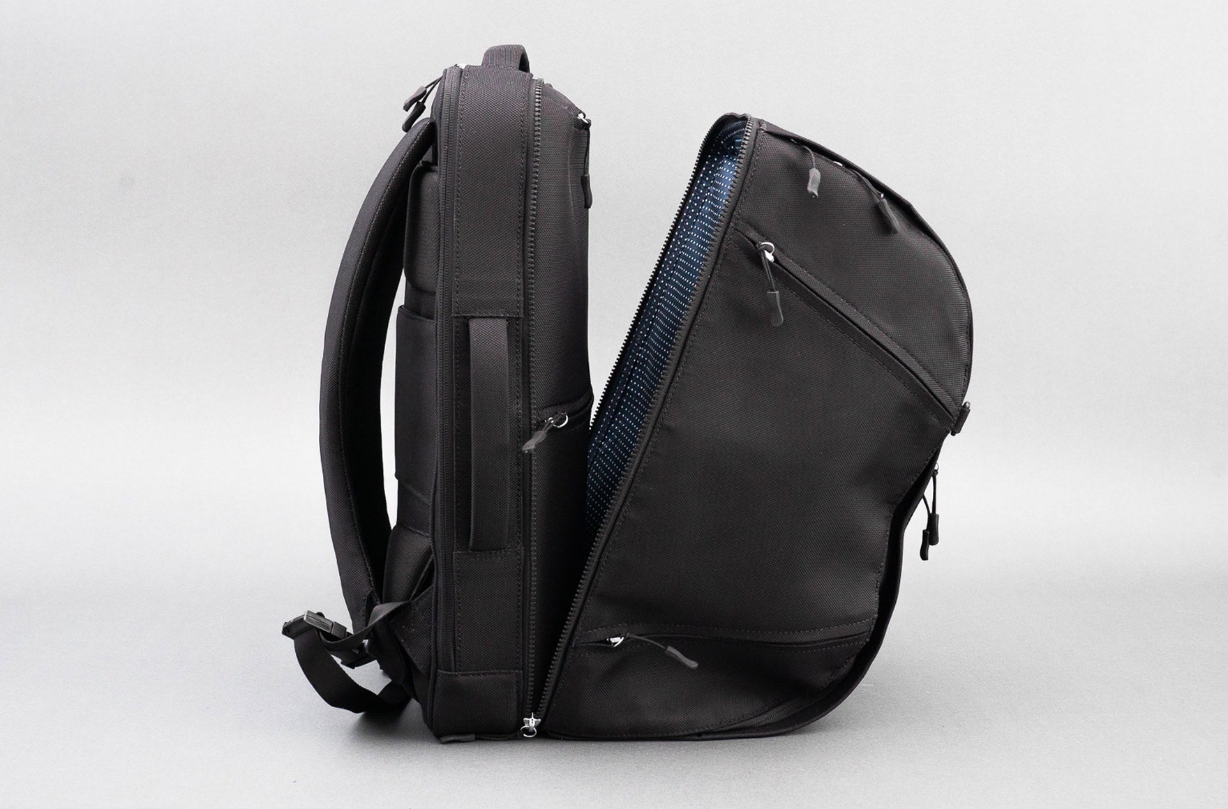 A versatile 5-in-1 Carry-On Bag displayed in various styles including a duffle, briefcase, and backpack.