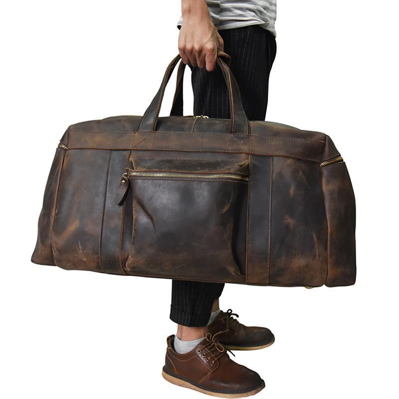 The Colden Duffle Bag made of durable crazy horse leather, featuring a spacious interior and elegant design, perfect for weekend travel.