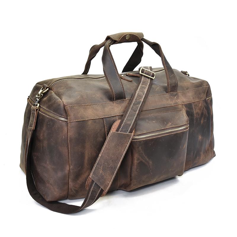 The Colden Duffle Bag made of durable crazy horse leather, featuring a spacious interior and elegant design, perfect for weekend travel.