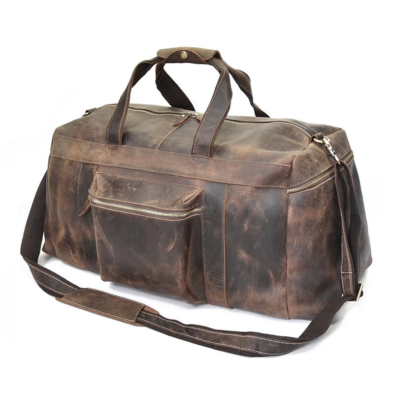 The Colden Duffle Bag made of durable crazy horse leather, featuring a spacious interior and elegant design, perfect for weekend travel.