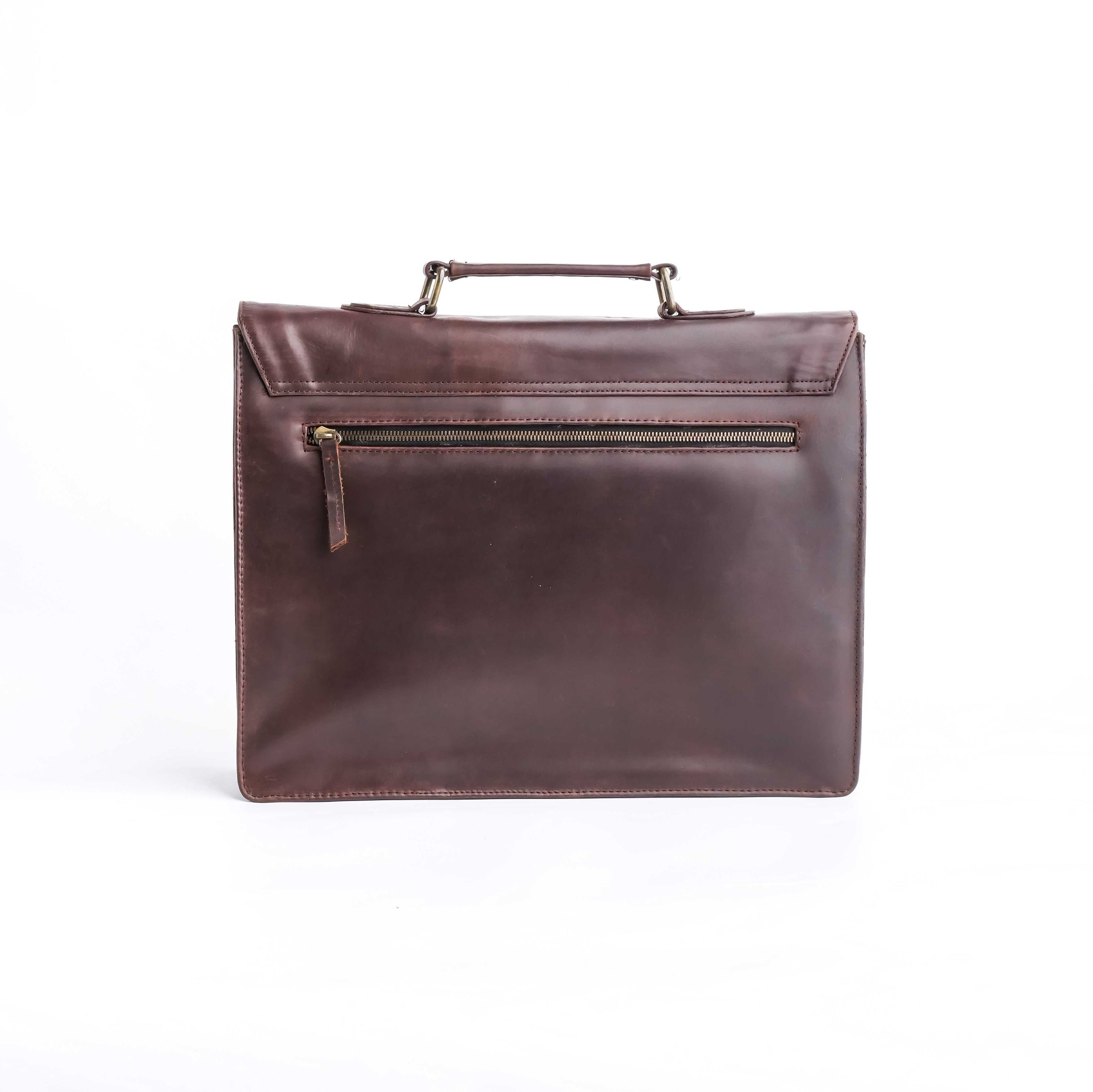 A stylish dark brown corporate pure leather bag with adjustable shoulder strap and top handle, showcasing its spacious compartments and elegant design.