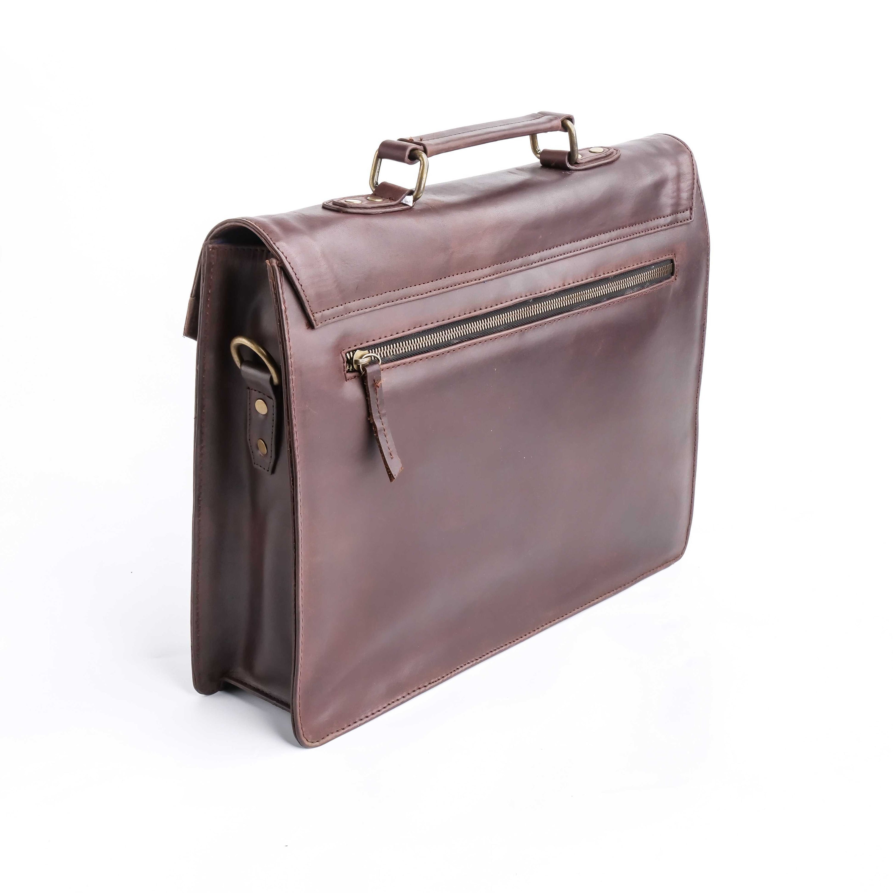 A stylish dark brown corporate pure leather bag with adjustable shoulder strap and top handle, showcasing its spacious compartments and elegant design.