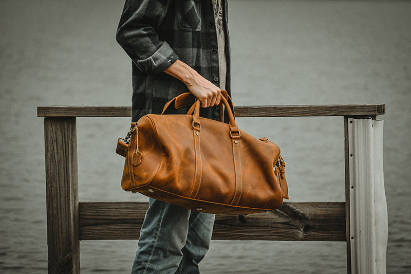 The Dagny Weekender large leather duffle bag in a stylish design, showcasing its high-quality crazy horse leather and spacious interior.