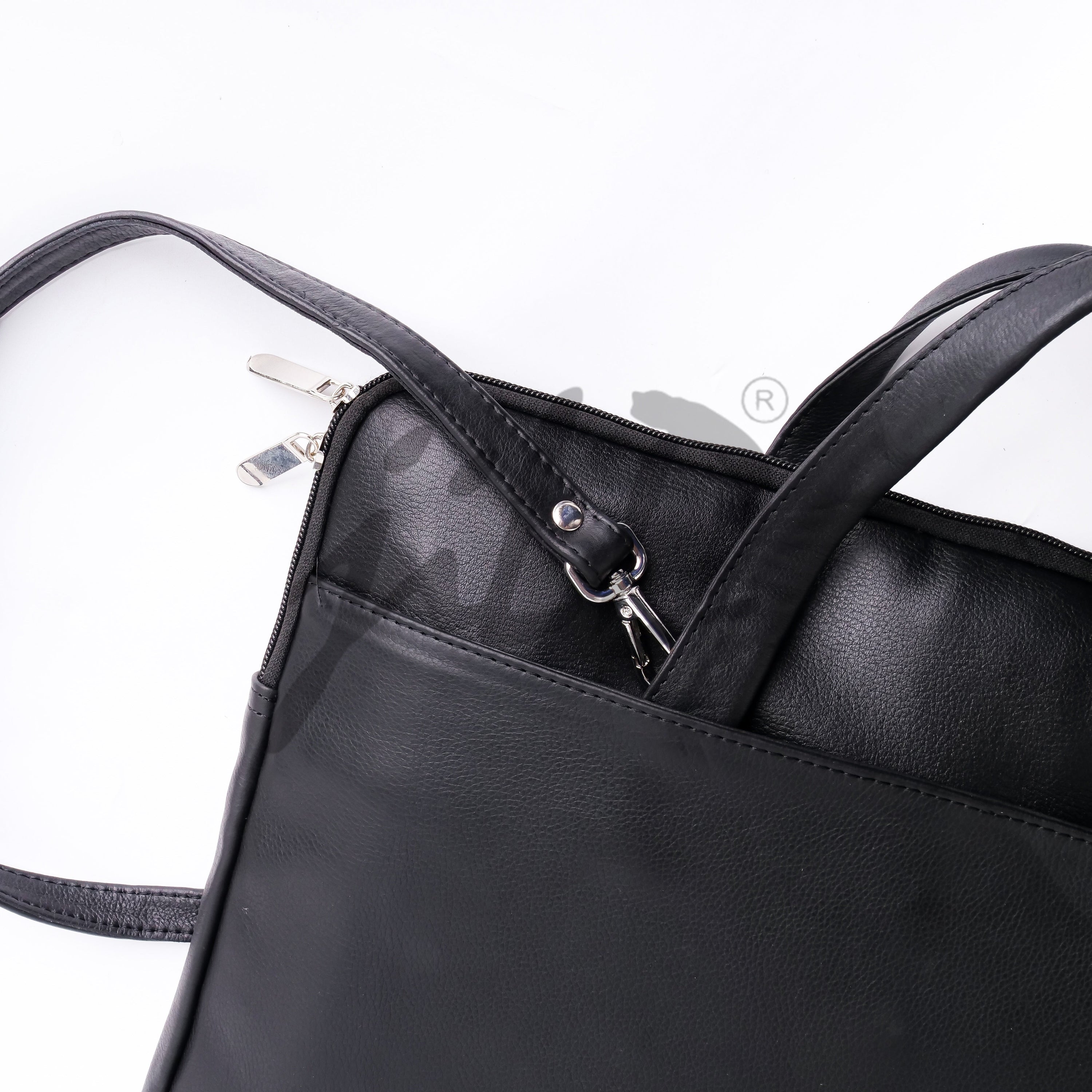 The Founder Ultra Slim Leather Laptop Bag in black, showcasing its sleek design and genuine leather material, perfect for carrying laptops and essentials.