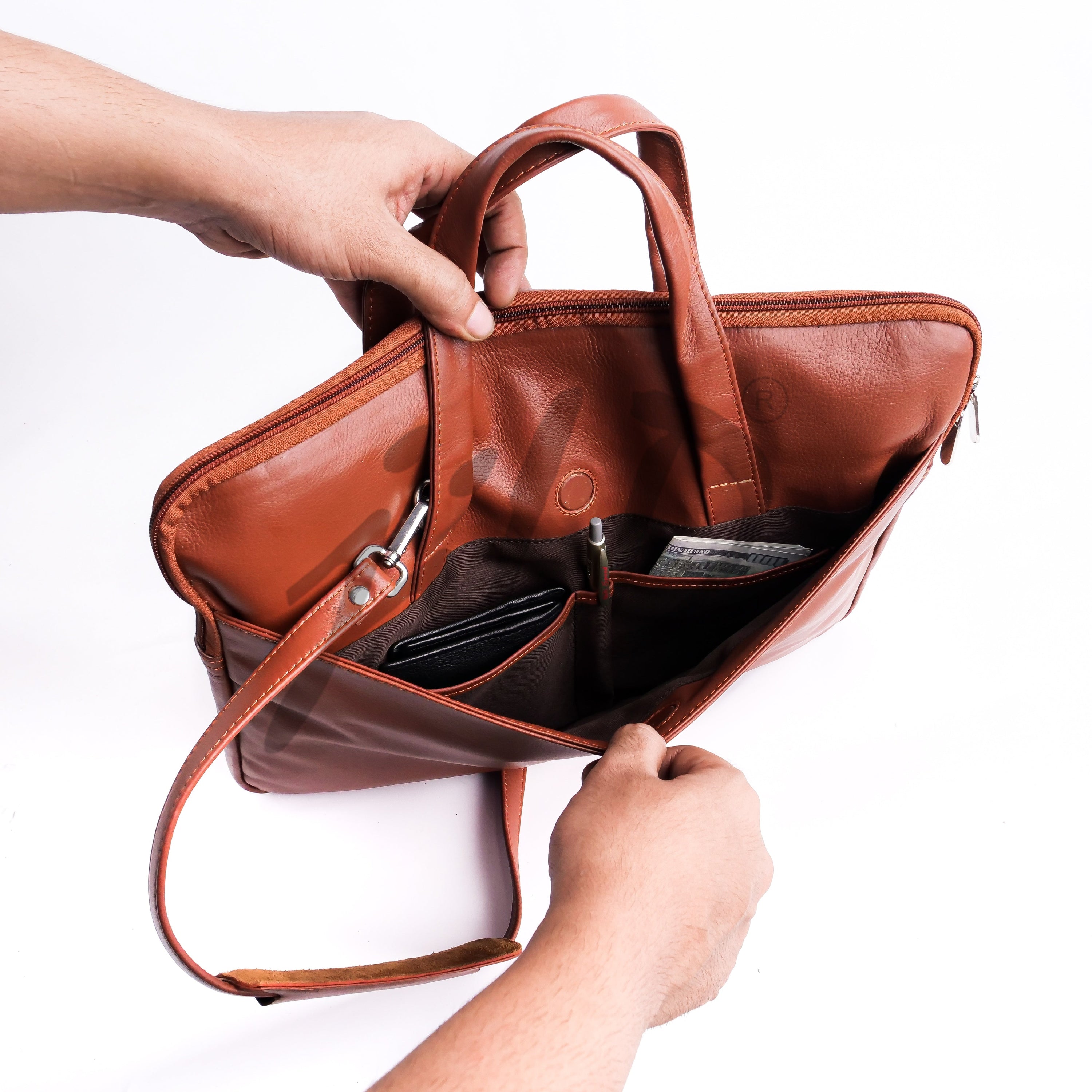 The Founder Ultra Slim Leather Laptop Bag in Tan Brown, showcasing its sleek design and high-quality leather finish.