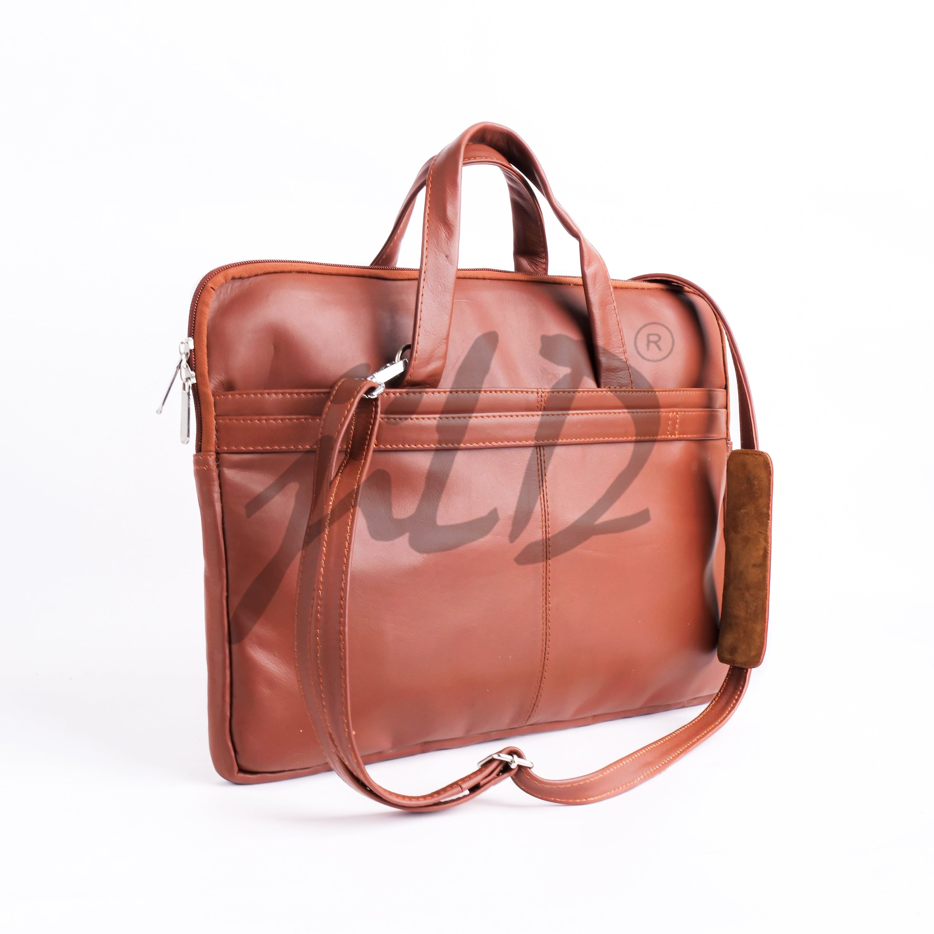 The Founder Ultra Slim Leather Laptop Bag in Tan Brown, showcasing its sleek design and high-quality leather finish.