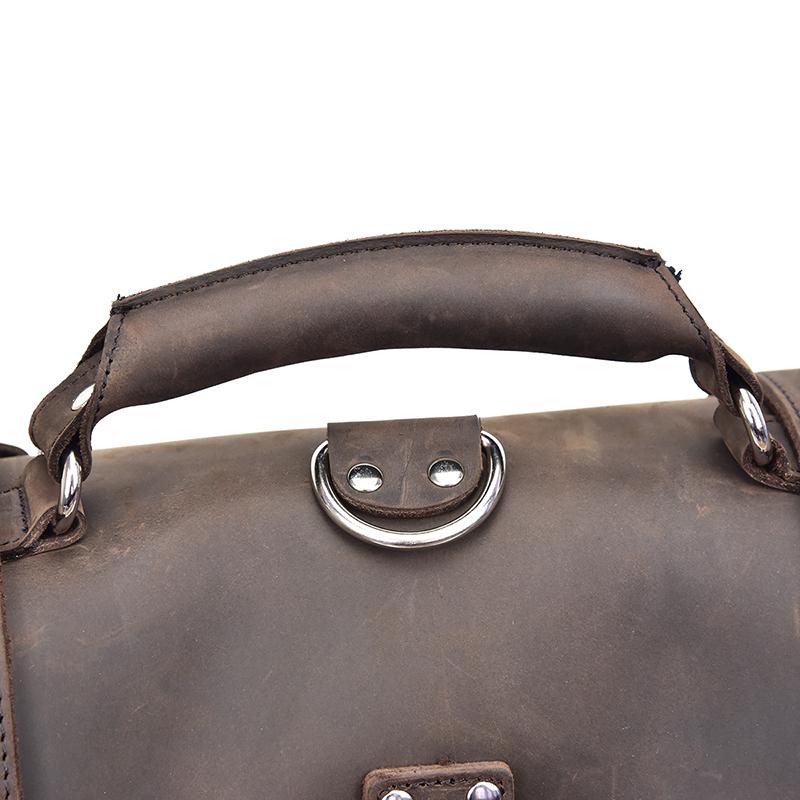 The Gustav Messenger Bag in vintage crazy horse leather, showcasing its large capacity and stylish design with removable strap.