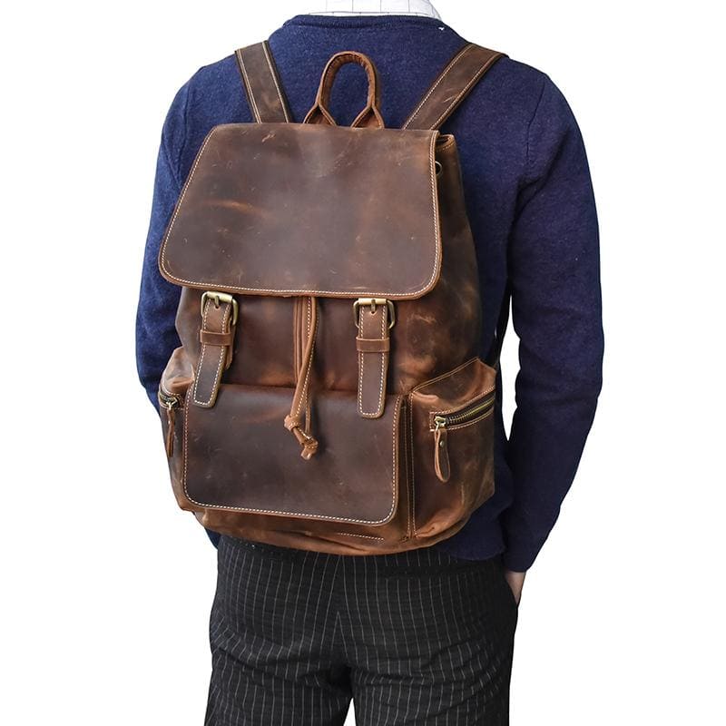 The Hagen Backpack, a vintage leather backpack made from genuine cowhide leather, showcasing its antique appearance and spacious design.