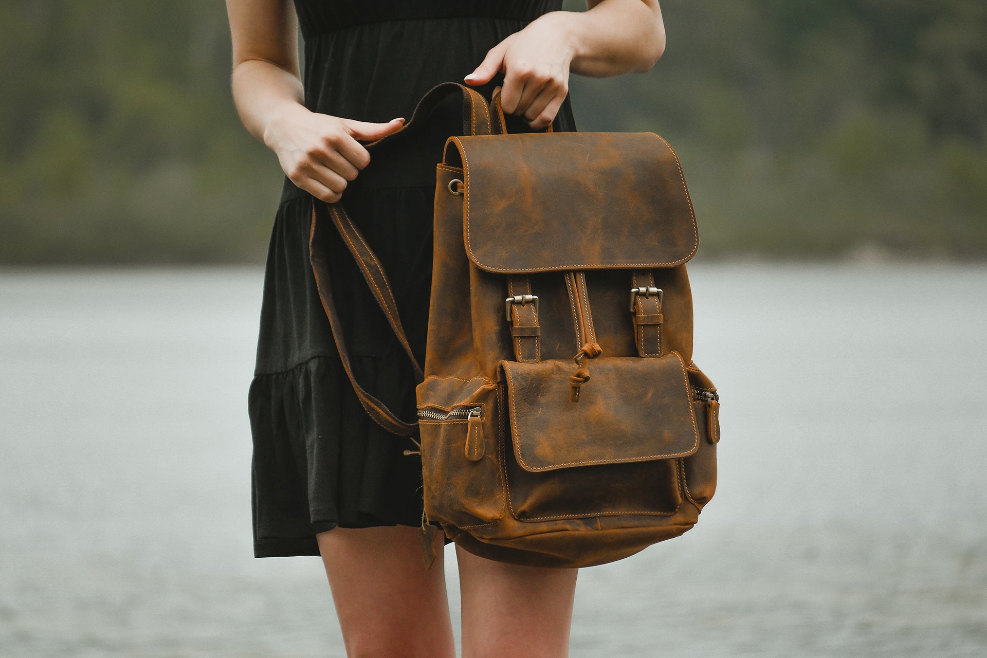 The Hagen Backpack, a vintage leather backpack made from genuine cowhide leather, showcasing its antique appearance and spacious design.