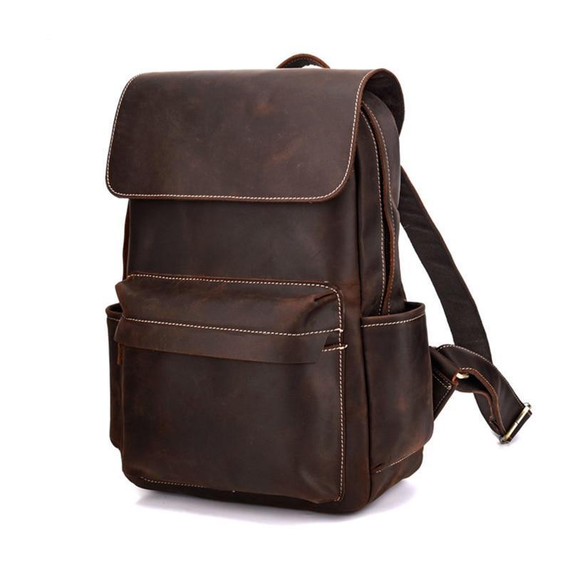 The Helka Backpack made of genuine vintage crazy horse leather, featuring multiple pockets and adjustable straps, ideal for daily use.