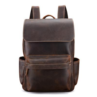 The Helka Backpack made of genuine vintage crazy horse leather, featuring multiple pockets and adjustable straps, ideal for daily use.