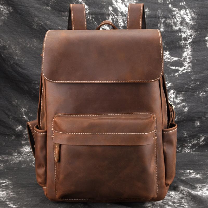 The Helka Backpack made of genuine vintage crazy horse leather, featuring multiple pockets and adjustable straps, ideal for daily use.