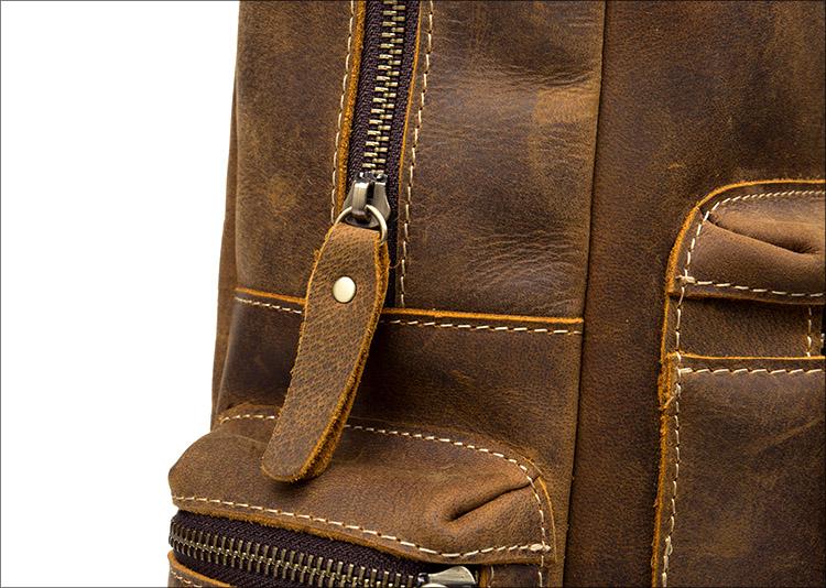 The Langley Backpack made from high-quality crazy horse leather, featuring a rustic deep chocolate brown color and multiple compartments.