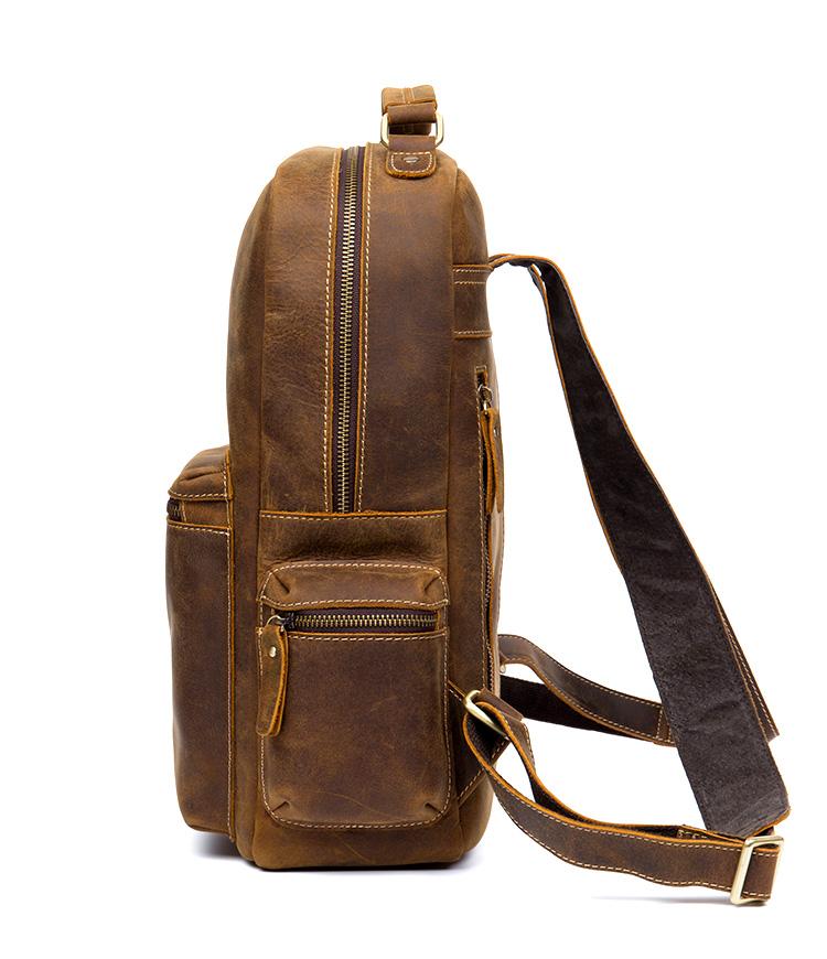 The Langley Backpack made from high-quality crazy horse leather, featuring a rustic deep chocolate brown color and multiple compartments.