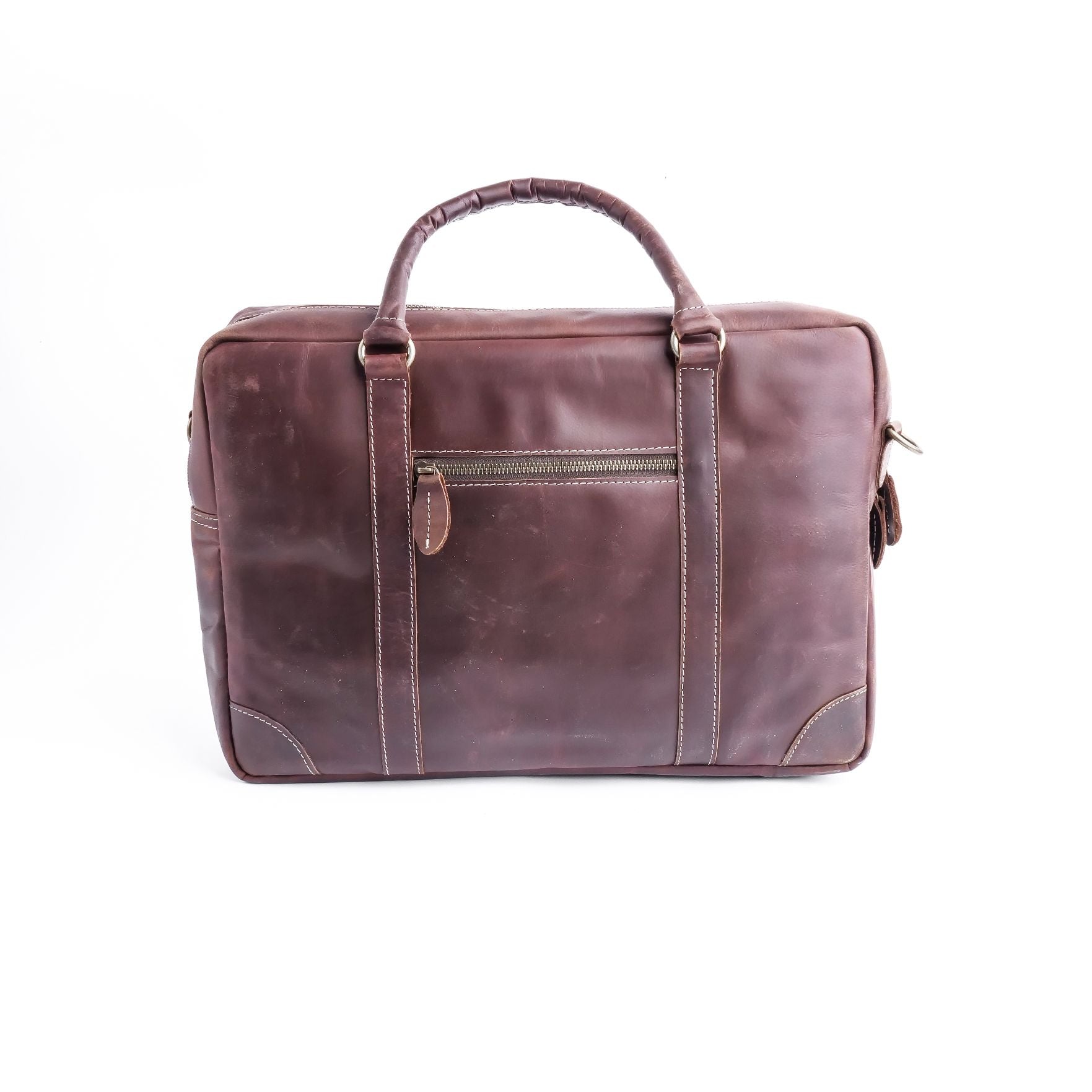 The Maverick Vintage Leather Laptop Bag in Midnight Brown, showcasing its premium leather, adjustable shoulder strap, and spacious design.