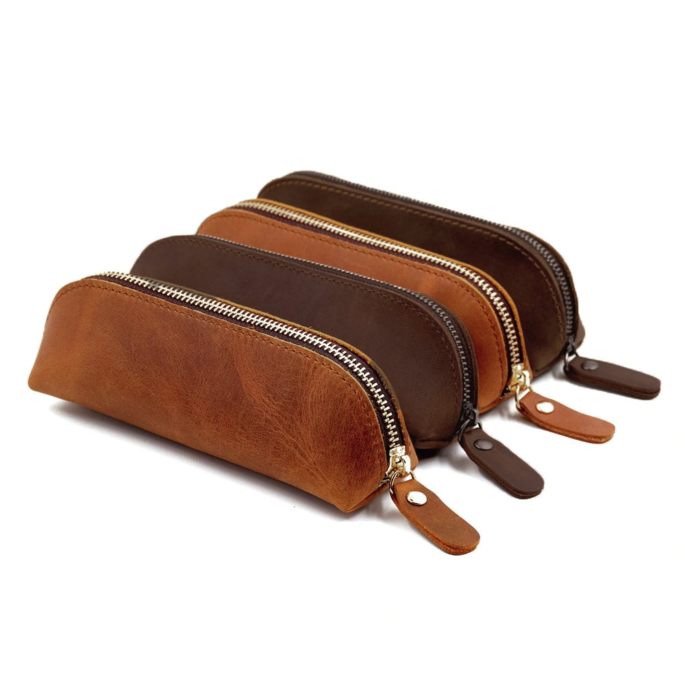 The Paavo Leather Pen Case made of full grain leather, featuring a brass YKK zipper, ideal for pens and makeup.