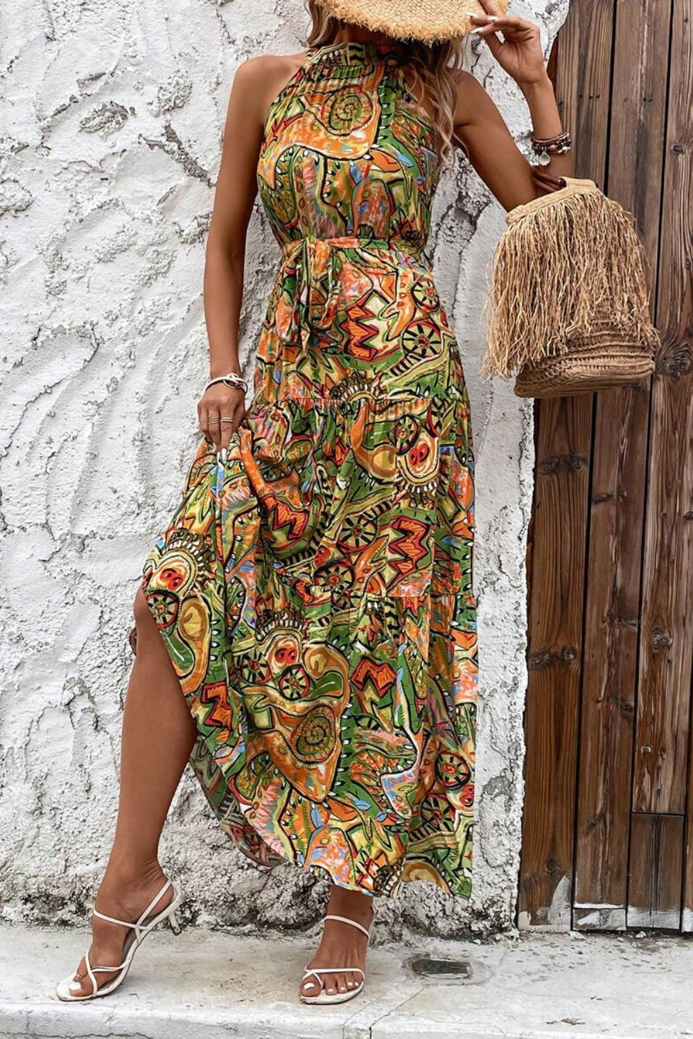 A beautiful Tied Floral Sleeveless Dress featuring a floral pattern, tied detail, and a comfortable fit, perfect for summer occasions.