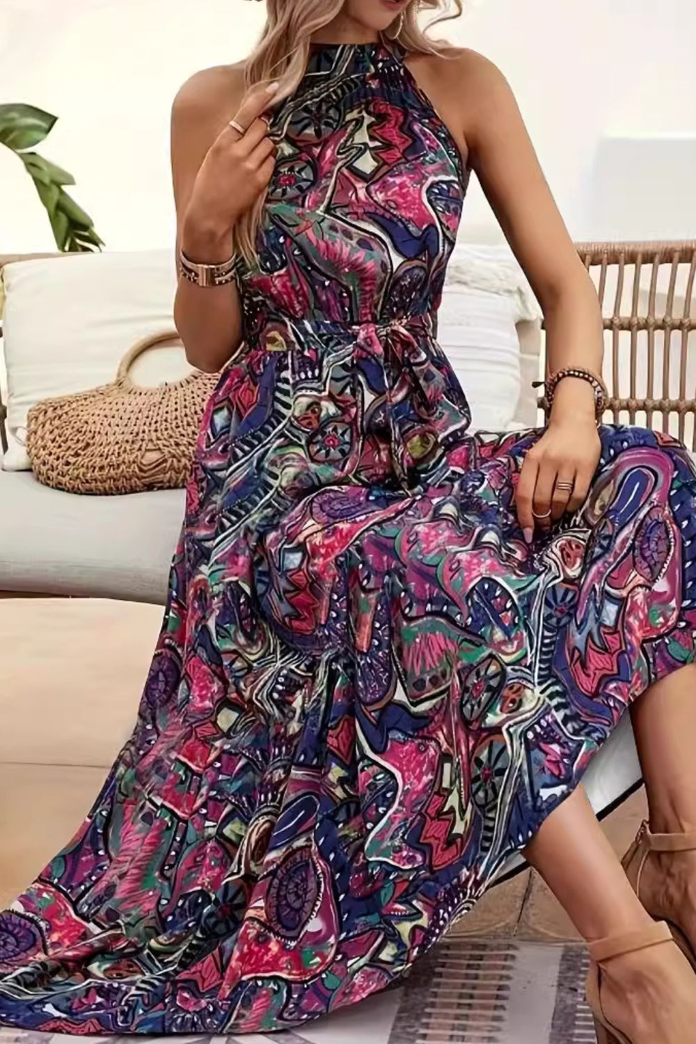 A beautiful Tied Floral Sleeveless Dress featuring a floral pattern, tied detail, and a comfortable fit, perfect for summer occasions.