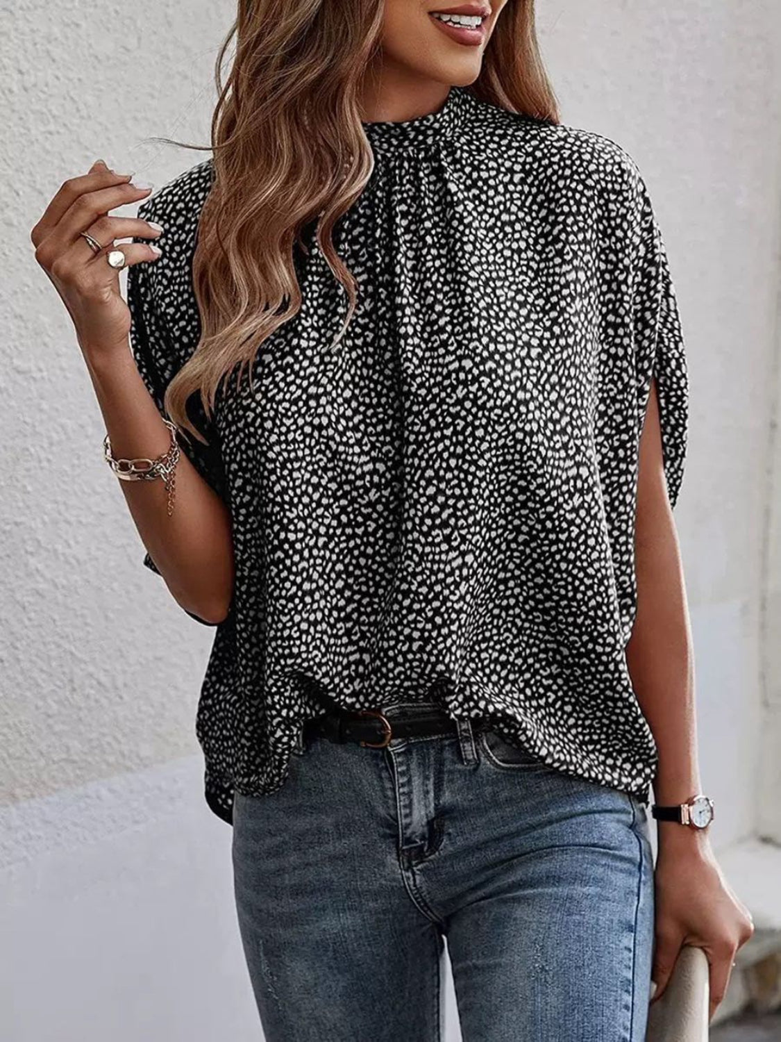 Tied Printed Mock Neck Half Sleeve Blouse in a stylish design, showcasing its elegant tied feature and mock neck.